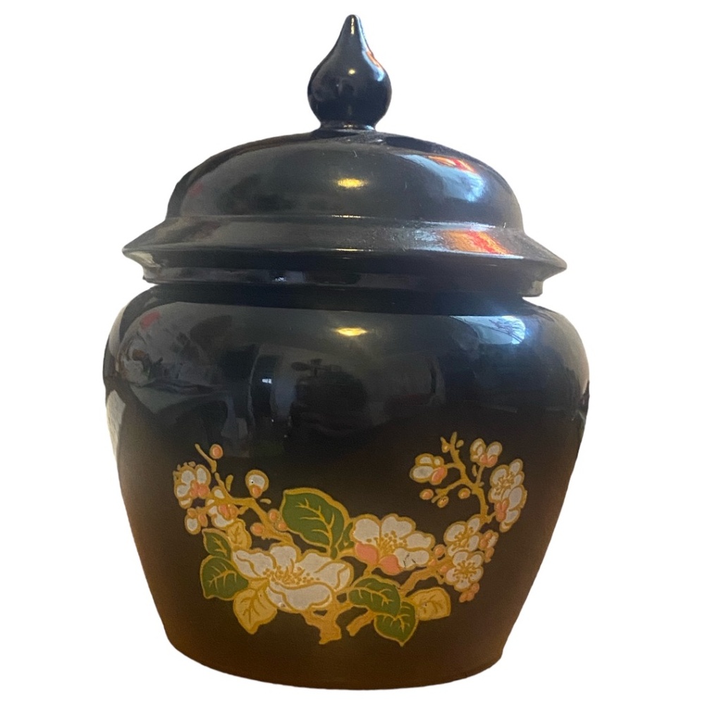 Vintage Avon floral motif glass trinket vase with lid